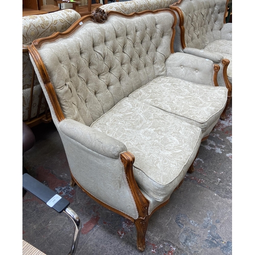 108 - A French Louis XV style carved beech and fabric upholstered two seater sofa - approx. 96cm high x 14... 