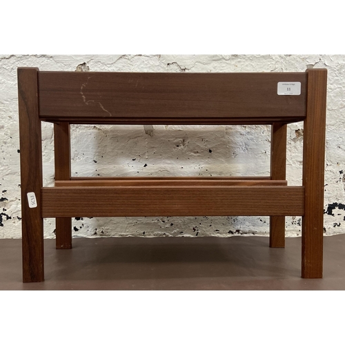 11 - A mid 20th century Guy Rodgers for Heals teak magazine rack - approx. 36cm high x 51cm wide x 20cm d... 