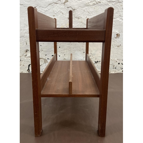 11 - A mid 20th century Guy Rodgers for Heals teak magazine rack - approx. 36cm high x 51cm wide x 20cm d... 