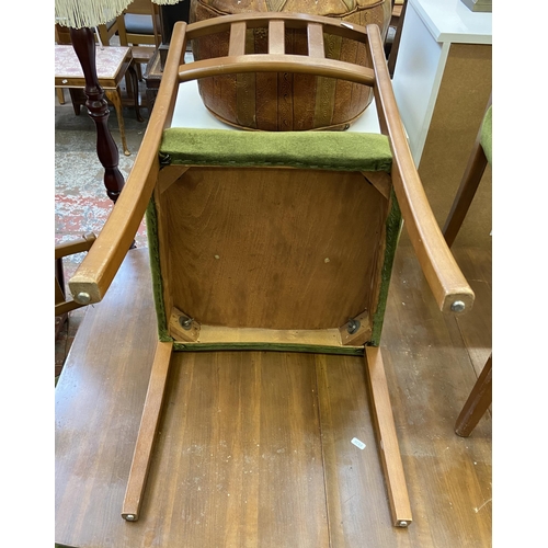 113 - A mid 20th century walnut and beech drop leaf gate leg dining table and six green fabric upholstered... 