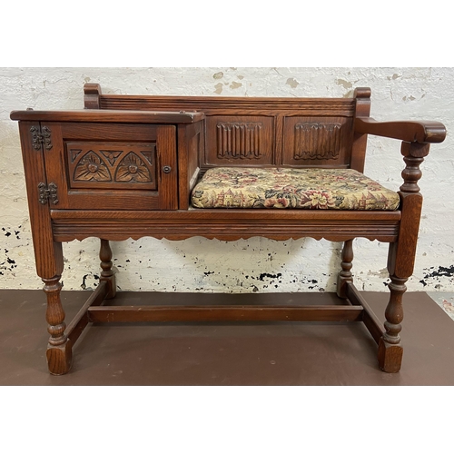 117 - Two pieces of Old Charm carved oak furniture, one telephone table - approx. 75cm high x 92cm wide x ... 