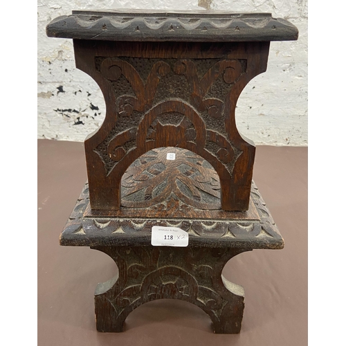 118 - Two late 19th/early 20th century carved oak stools - largest approx. 18cm high x 24cm wide x 37cm lo... 