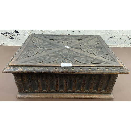 119 - A late 19th/early 20th century carved oak bible box - approx. 16cm high x 44cm wide x 38cm deep