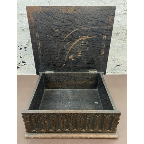 119 - A late 19th/early 20th century carved oak bible box - approx. 16cm high x 44cm wide x 38cm deep