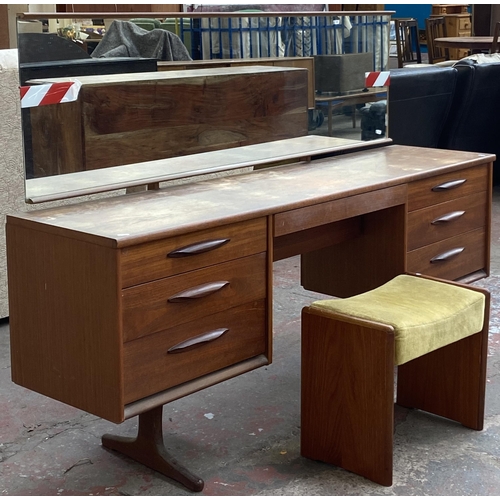 12 - A mid 20th century Austinsuite teak dressing table and stool - approx. 118cm high x 169cm wide x 42c... 