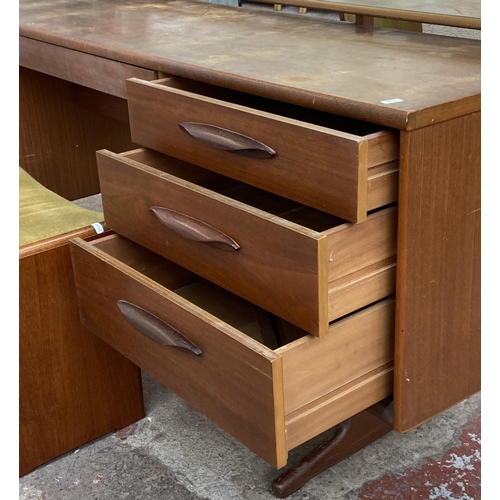 12 - A mid 20th century Austinsuite teak dressing table and stool - approx. 118cm high x 169cm wide x 42c... 