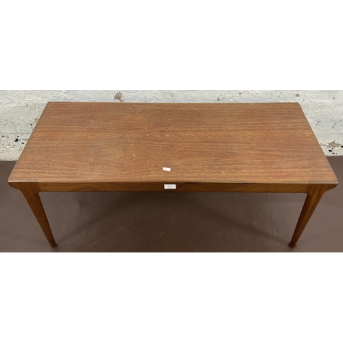 120 - A mid 20th century teak rectangular coffee table - approx. 42cm high x 46cm wide x 106cm long