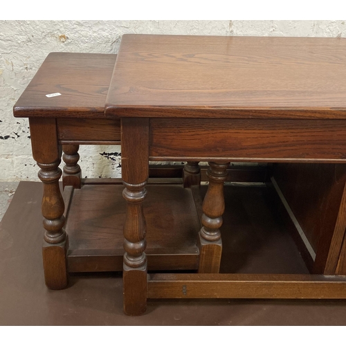 122 - An Old Charm carved oak nest of three tables - approx. 46cm high x 51cm wide x 122cm long