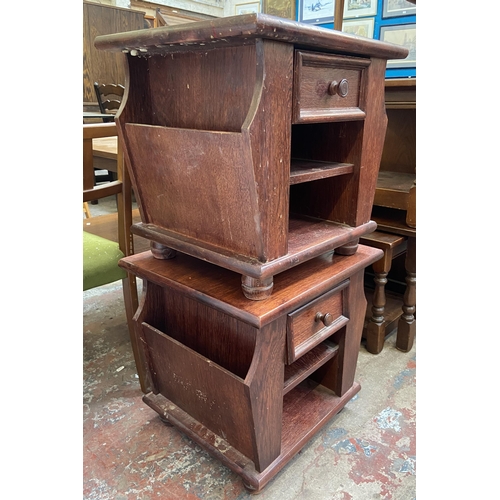 123 - A pair of stained oak magazine rack side tables - approx. 49cm high x 51cm wide x 46cm deep