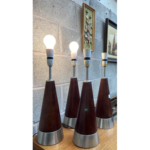 13 - Four modern hardwood and brushed steel touch sensitive table lamps - approx. 47cm high