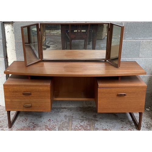 15 - A mid 20th century G Plan Quadrille teak dressing table - approx. 118cm high x 151cm wide x 46cm dee... 