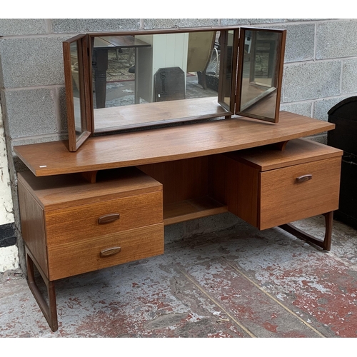 15 - A mid 20th century G Plan Quadrille teak dressing table - approx. 118cm high x 151cm wide x 46cm dee... 