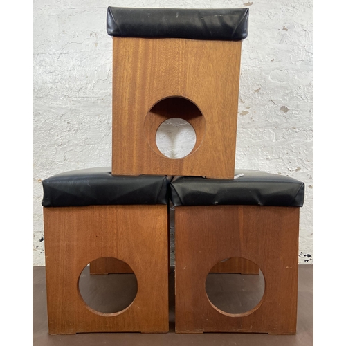 18 - Three mid 20th century teak and black vinyl dressing table stools - approx. 50cm high x 53cm wide x ... 