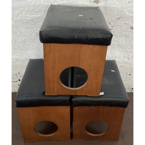 18 - Three mid 20th century teak and black vinyl dressing table stools - approx. 50cm high x 53cm wide x ... 