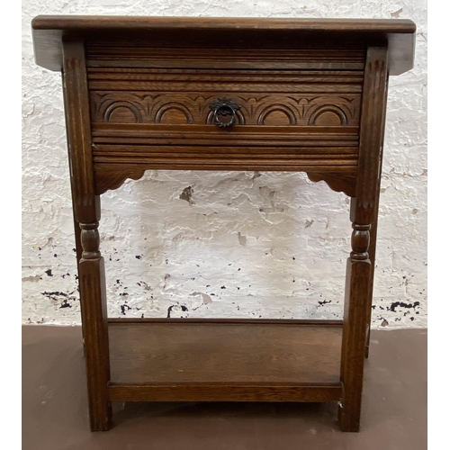 25 - A 17th century style carved oak console table - approx. 72cm high x 81cm wide x 37cm deep