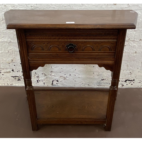 25 - A 17th century style carved oak console table - approx. 72cm high x 81cm wide x 37cm deep