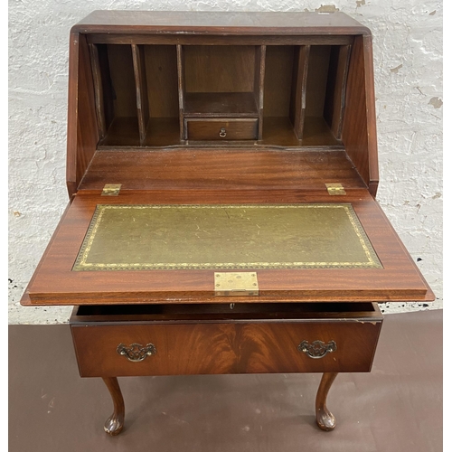 27 - A mahogany bureau on cabriole supports with fall front and green leather writing surface - approx. 1... 