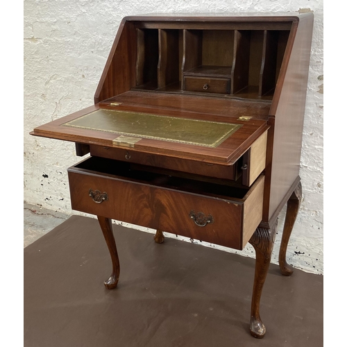 27 - A mahogany bureau on cabriole supports with fall front and green leather writing surface - approx. 1... 