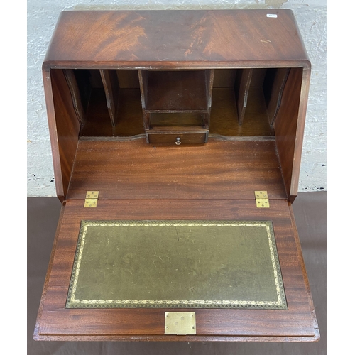 27 - A mahogany bureau on cabriole supports with fall front and green leather writing surface - approx. 1... 