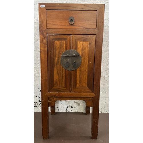 28 - A Chinese elm side cabinet with metal decoration - approx. 86cm high x 38cm wide x 38cm deep