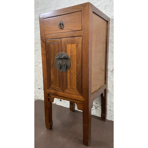 28 - A Chinese elm side cabinet with metal decoration - approx. 86cm high x 38cm wide x 38cm deep