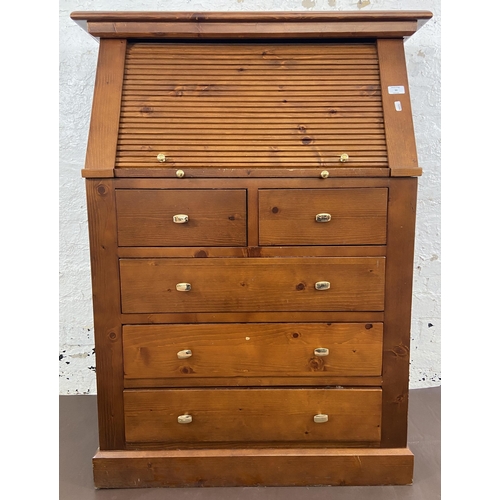 30 - A pine roll top bureau - approx. 117cm high x 87cm wide x 42cm deep