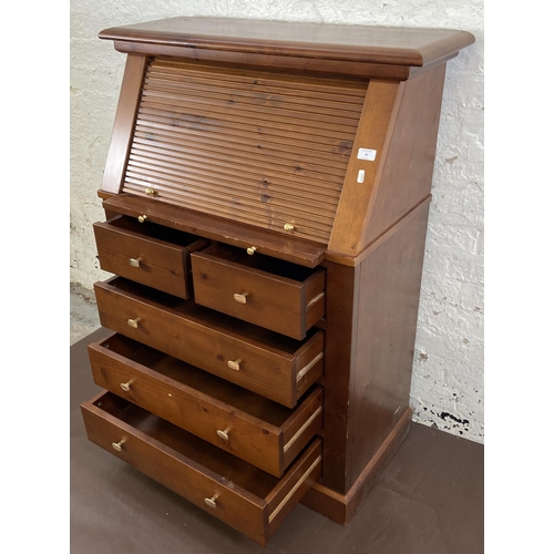 30 - A pine roll top bureau - approx. 117cm high x 87cm wide x 42cm deep