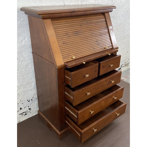 30 - A pine roll top bureau - approx. 117cm high x 87cm wide x 42cm deep