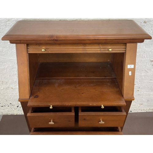 30 - A pine roll top bureau - approx. 117cm high x 87cm wide x 42cm deep