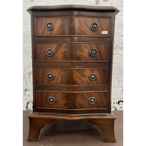 35 - A Regency style mahogany serpentine miniature chest of drawers on bracket supports - approx. 61cm hi... 