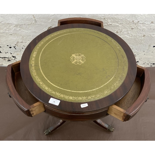 36 - A Regency style mahogany and green leather drum table - approx. 59.5cm high x 50cm diameter