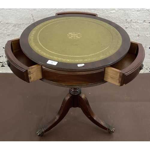 36 - A Regency style mahogany and green leather drum table - approx. 59.5cm high x 50cm diameter