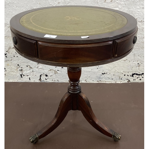 36 - A Regency style mahogany and green leather drum table - approx. 59.5cm high x 50cm diameter