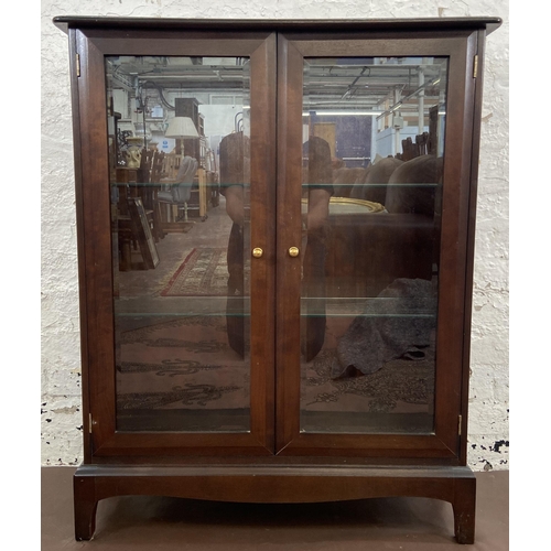 38 - A Stag Minstrel mahogany display cabinet - approx. 100cm high x 80cm wide x 25cm deep