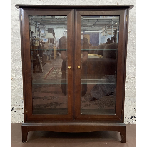 38 - A Stag Minstrel mahogany display cabinet - approx. 100cm high x 80cm wide x 25cm deep