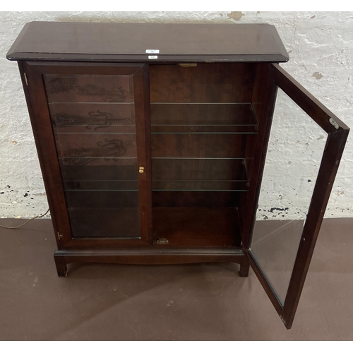 38 - A Stag Minstrel mahogany display cabinet - approx. 100cm high x 80cm wide x 25cm deep