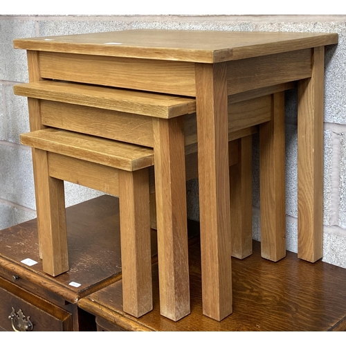 39 - A modern solid oak nest of three tables - approx. 50cm high x 60cm wide x 40cm deep