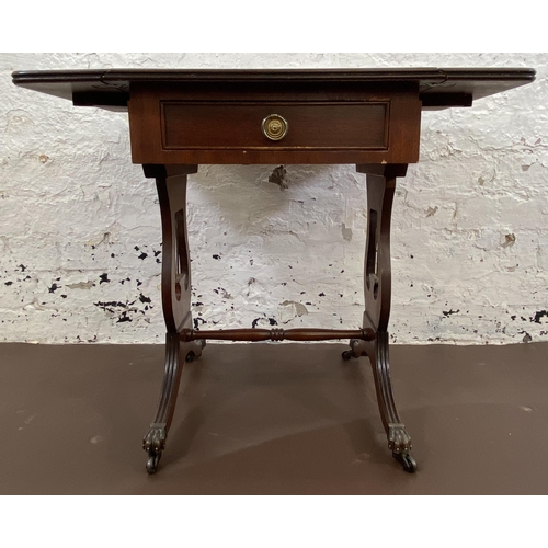 43 - A J. Sydney Smith mahogany drop leaf lyre end side table - approx. 55cm high x 66cm wide x 40cm deep