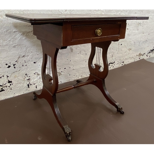 43 - A J. Sydney Smith mahogany drop leaf lyre end side table - approx. 55cm high x 66cm wide x 40cm deep