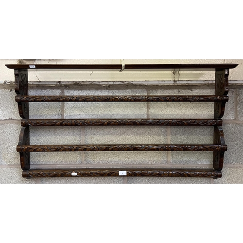 5 - A Victorian carved mahogany wall hanging two tier plate rack - approx. 57cm high x 104cm wide x 13cm... 