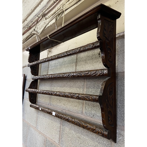 5 - A Victorian carved mahogany wall hanging two tier plate rack - approx. 57cm high x 104cm wide x 13cm... 