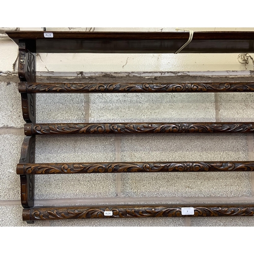 5 - A Victorian carved mahogany wall hanging two tier plate rack - approx. 57cm high x 104cm wide x 13cm... 