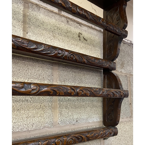 5 - A Victorian carved mahogany wall hanging two tier plate rack - approx. 57cm high x 104cm wide x 13cm... 