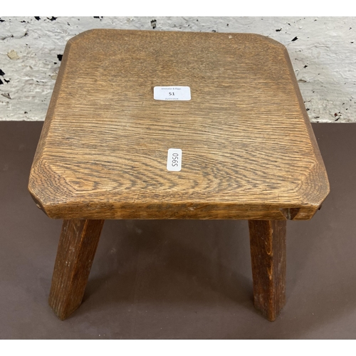 51 - An early 20th century oak farmhouse stool - approx. 25cm high x 26cm wide x 25cm deep