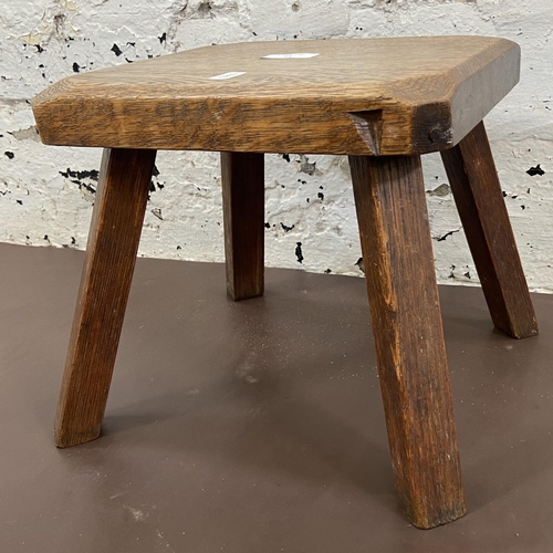 51 - An early 20th century oak farmhouse stool - approx. 25cm high x 26cm wide x 25cm deep