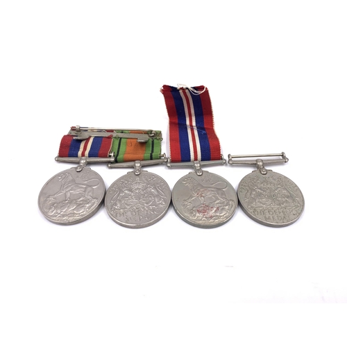 2201 - Five WWII British medals, three War and two The Defence