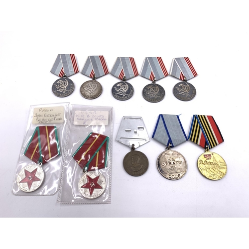 2204 - Ten USSR medals to include 20 Years Excellent Service, Order of Courage, Veteran of Labour etc.