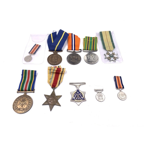 2206 - Ten South African medals to include Police Star for Faithful Service, Rhodesian Legion of Merit, The... 