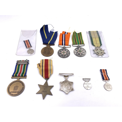 2206 - Ten South African medals to include Police Star for Faithful Service, Rhodesian Legion of Merit, The... 