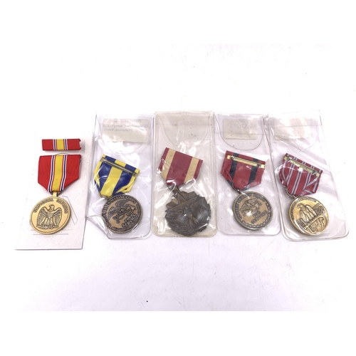 2219 - Ten American medals to include WWII Marine Corps Fidelity Zeal Obedience, Army Commendation, Asiatic... 